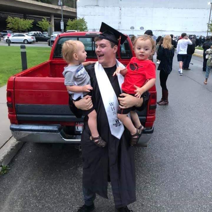 Colten holding Kids